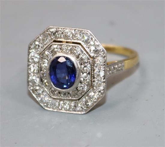 A 1940s/1950s 18ct gold, sapphire and diamond set octagonal cluster ring, size T.